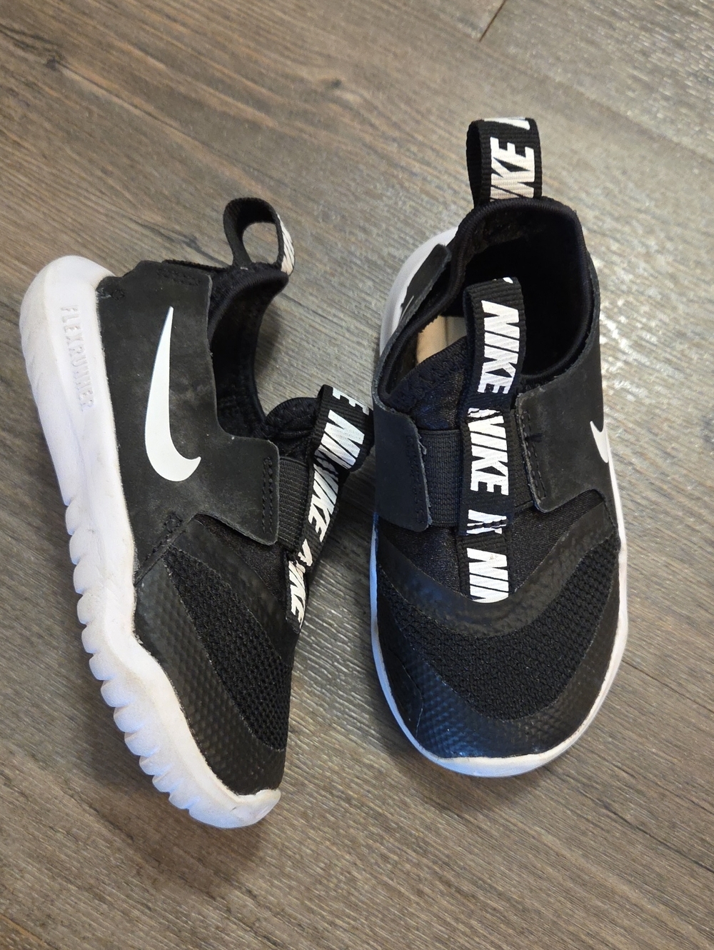 Nike • "Flex Runner" Baby's Black & White Slip-On Sneakers